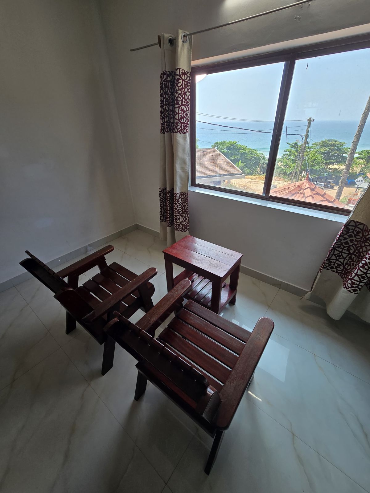 Balcony chairs facing the sea